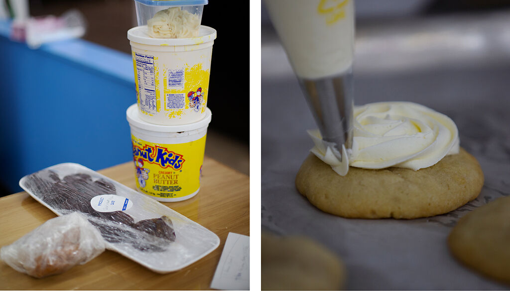 Icing and other baking components lay on a counter
